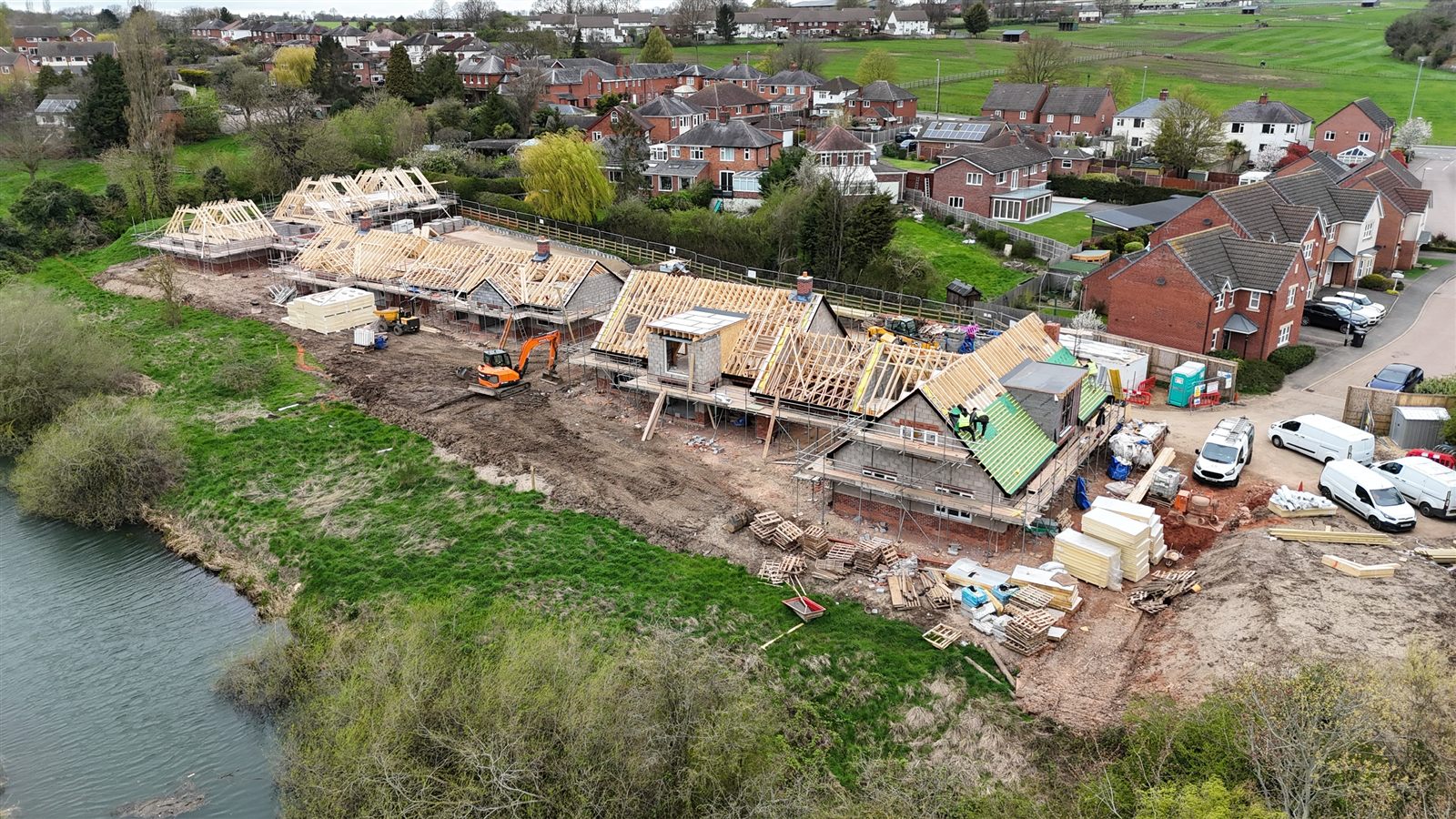Cooper Lennard homes under construction beside the river