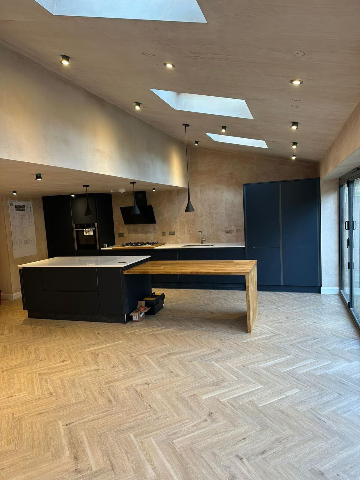 Extended kitchen with rooflights and garden doors