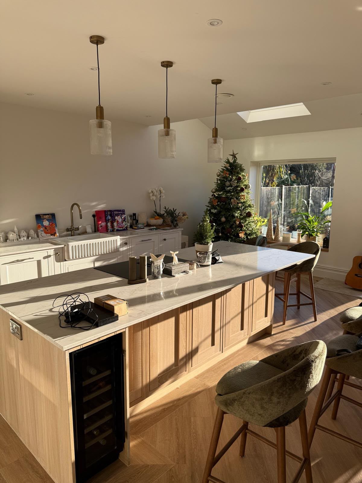 Sunlit kitchen with large central island